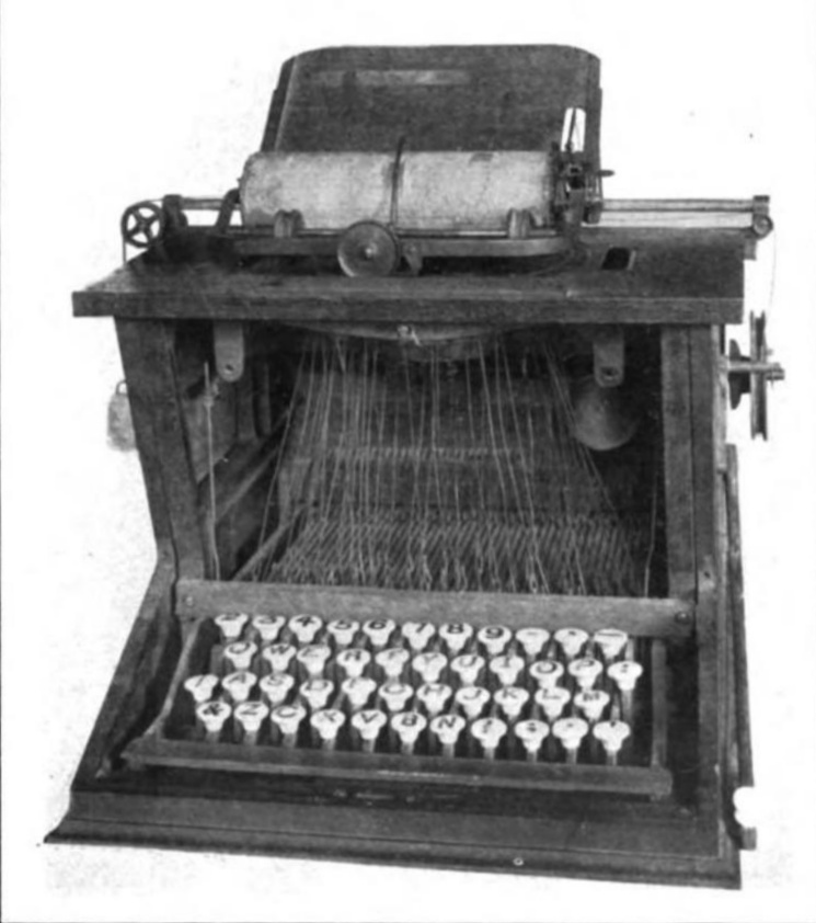 https://upload.wikimedia.org/wikipedia/commons/9/9a/Sholes_typewriter.jpg