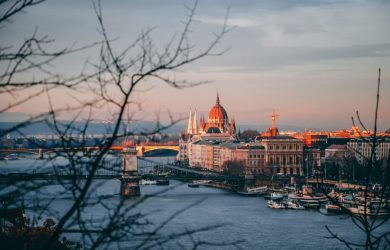 high-angle photography of dome building near bridge and body of water