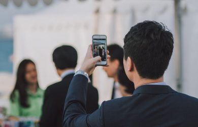 Man Taking Picture on People