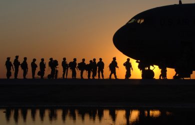 Soldiers in Line to Get in a Plane