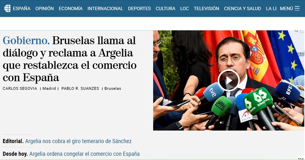 Może być zdjęciem przedstawiającym 3 osoby i tekst „ESPAÑA OPINIÓN ECONOMÍA INTERNACIONAL DEPORTES CULTURA LOC TELEVISIÓN CIENCIA SALUD LALE MENÚ Gobierno. Bruselas llama al diálogo y reclama a Argelia que restablezca el comercio con España CARLOS SEGOVIA Madrid PABLO R. SUANZES Bruselas tve O Editorial. Argelia nos cobra el giro temerario de Sánchez LaSerh Sata Serta ATLAS C Desde hoy. Argelia ordena congelar el comercio con España”