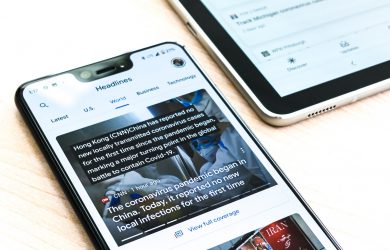 silver iphone 6 on brown wooden table